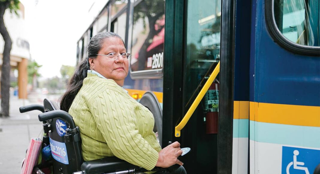 Handicap person boards Santa Cruz Metro bus