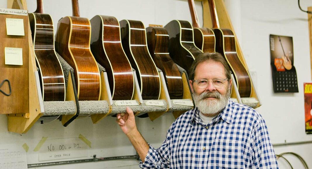 Santa Cruz Guitar Company owner with guitars