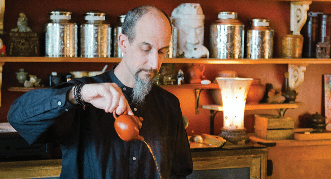 David Wright pours tea at Hidden Peak Teahouse