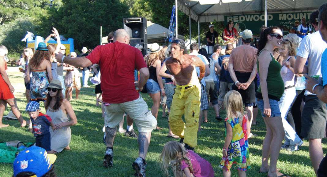 2017 Redwood Mountain Faire people dancing on the grass