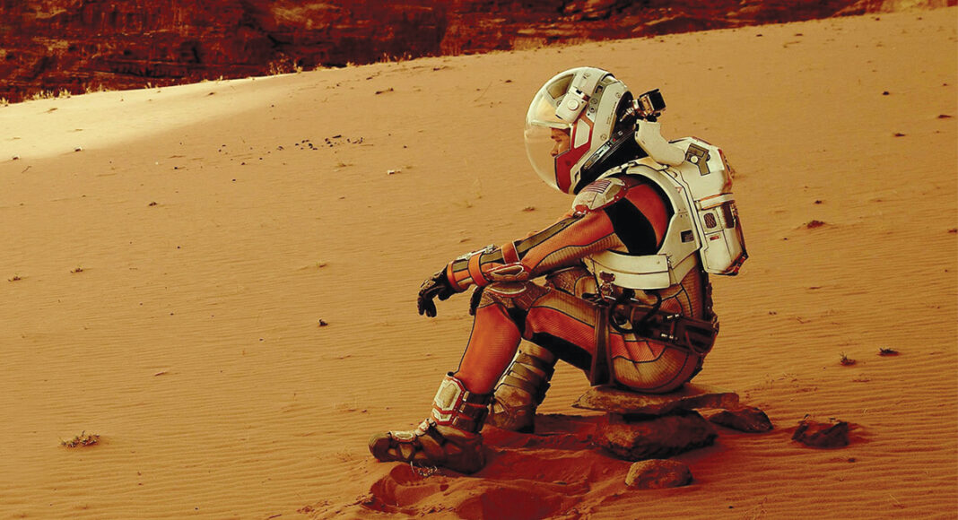 Matt Damon in movie 'The Martian' based on book by author Andy Weir