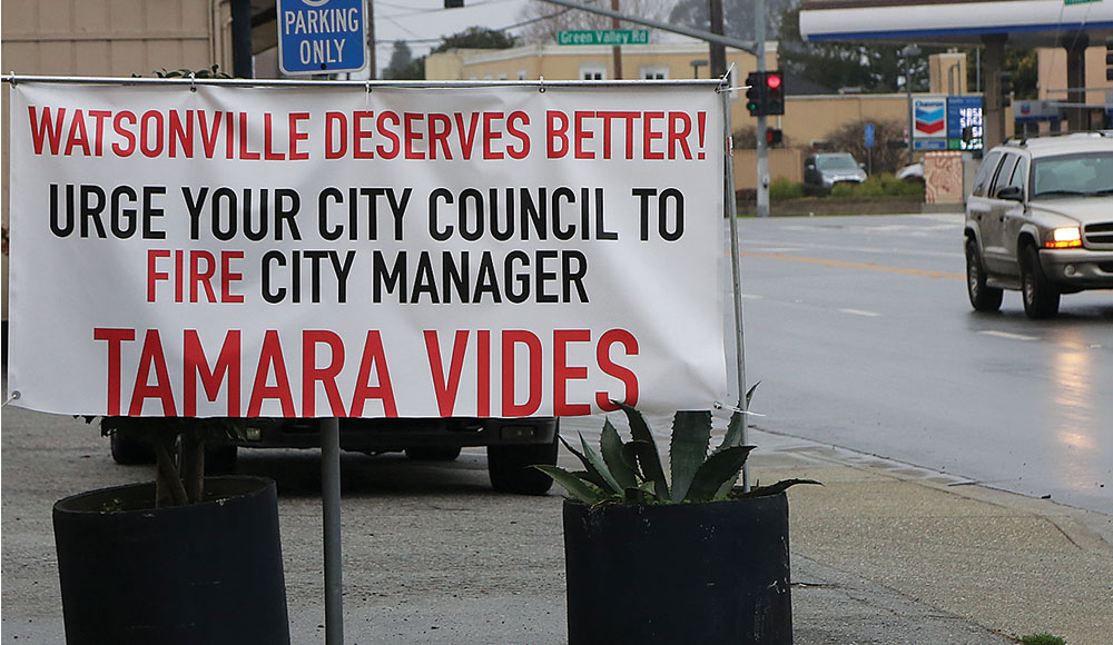 Sign on the street calling to replace Watsonville's city manager