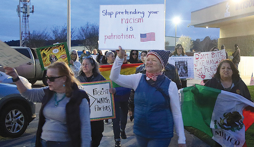 People protesting with signs